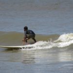 Surfer Kinder Kovalam